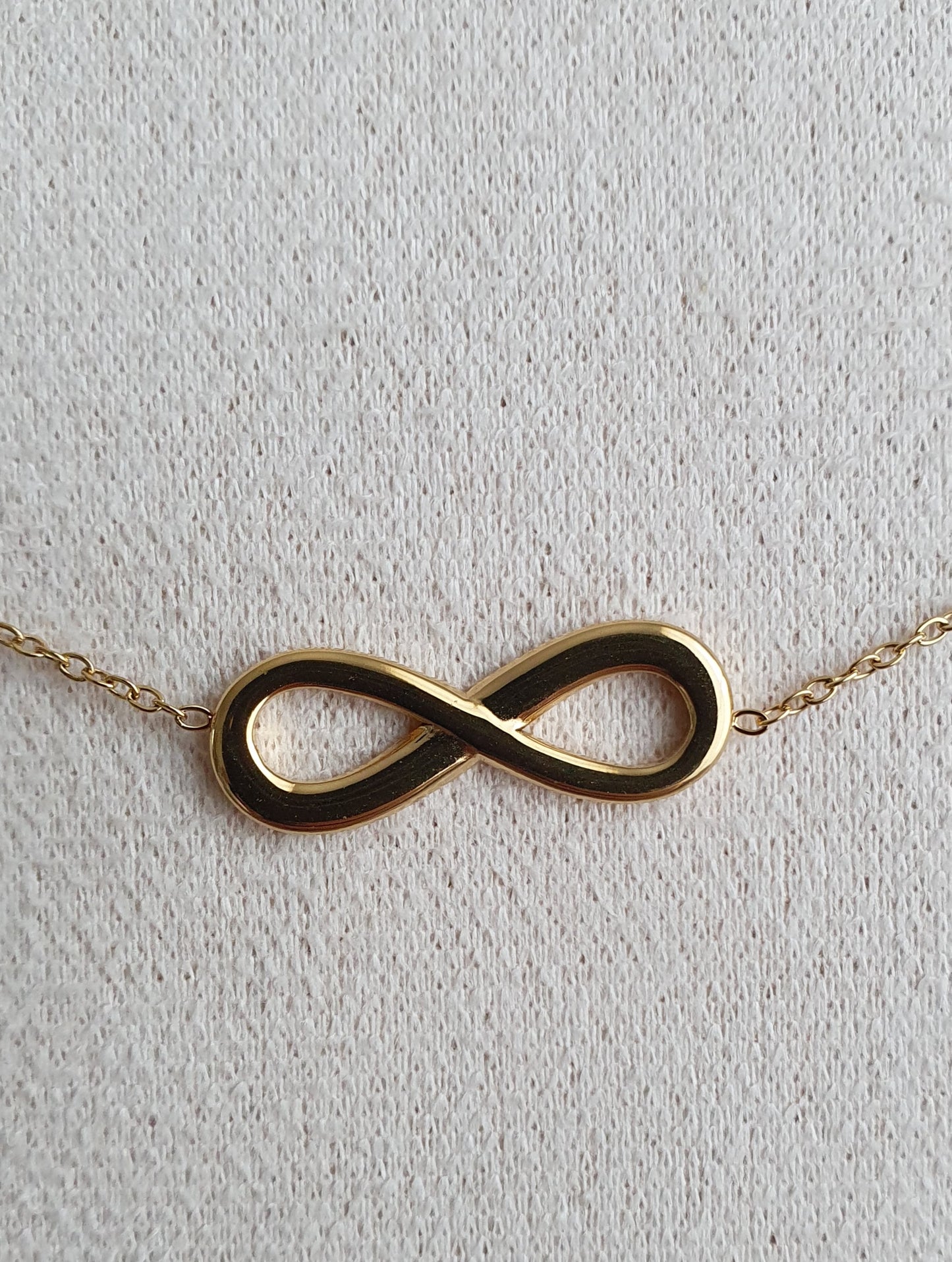 Bracelet signe infini acier inoxydable doré et argenté femme