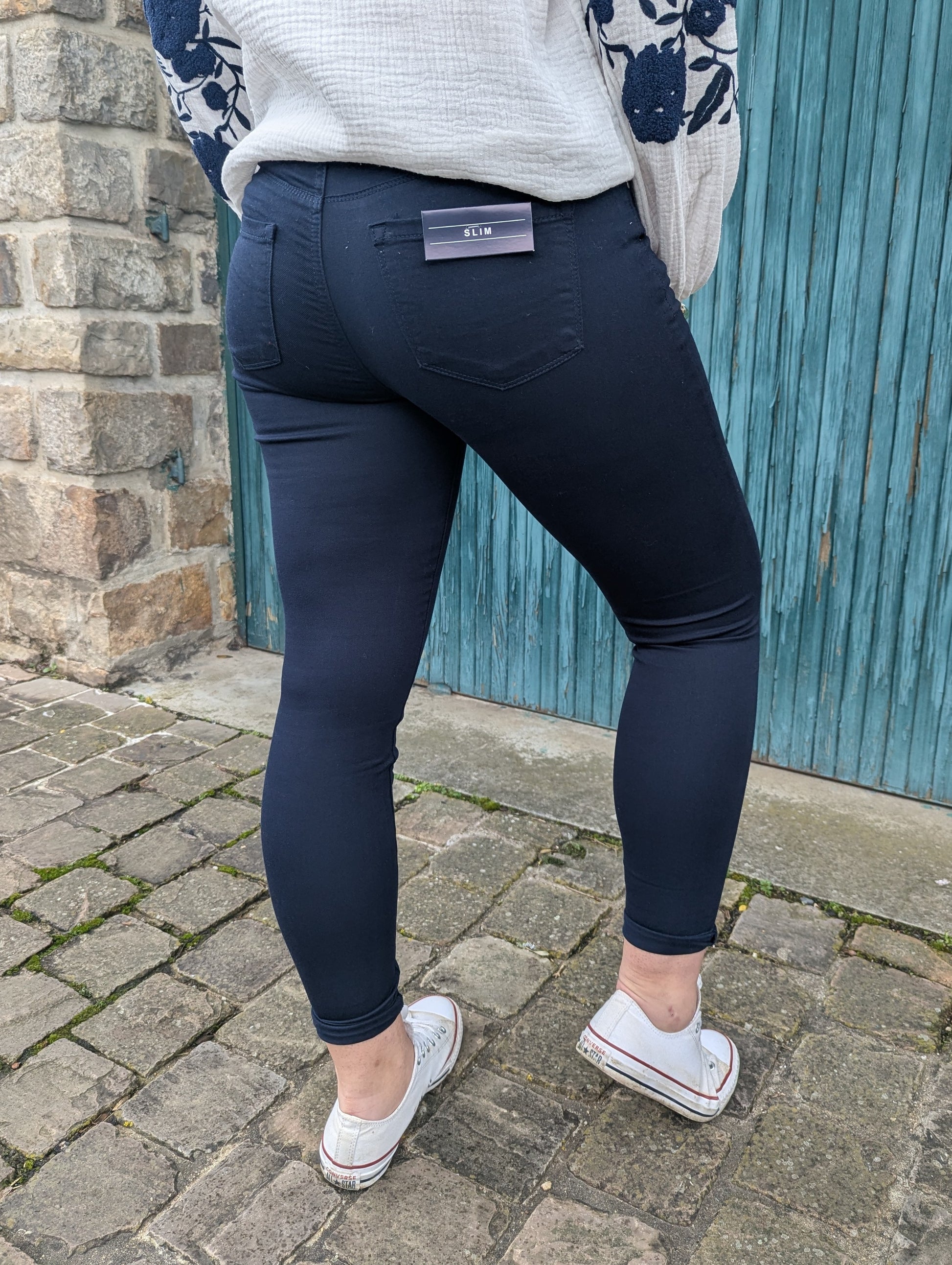 Jean pantalon skinny bleu marine effet peau de pêche