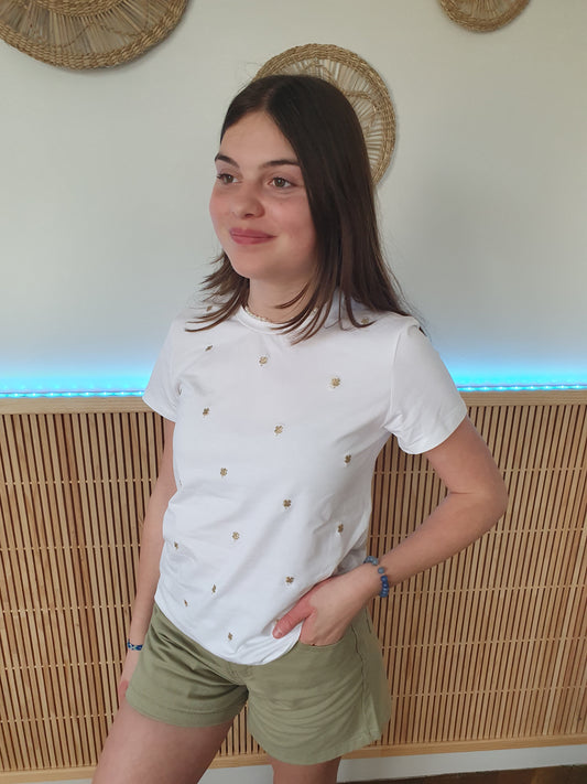 T-shirt blanc avec trèfles brodés dorés pour fille