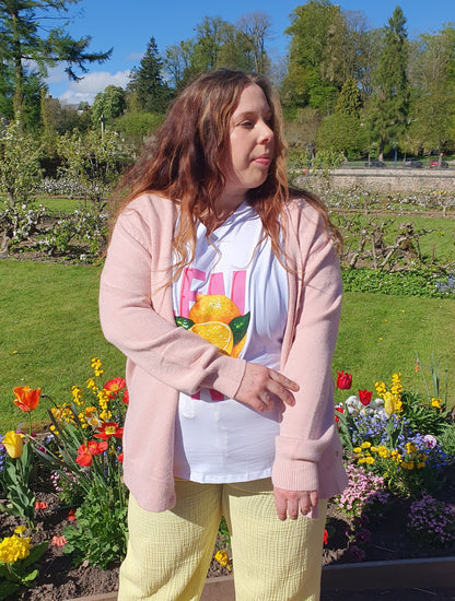 Gilet rose poudré avec boutons devant petit coeur doré